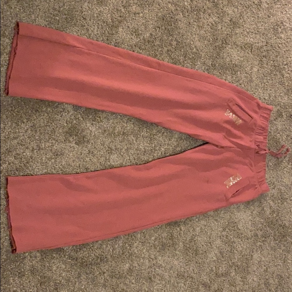 Pink frayed sweatpants